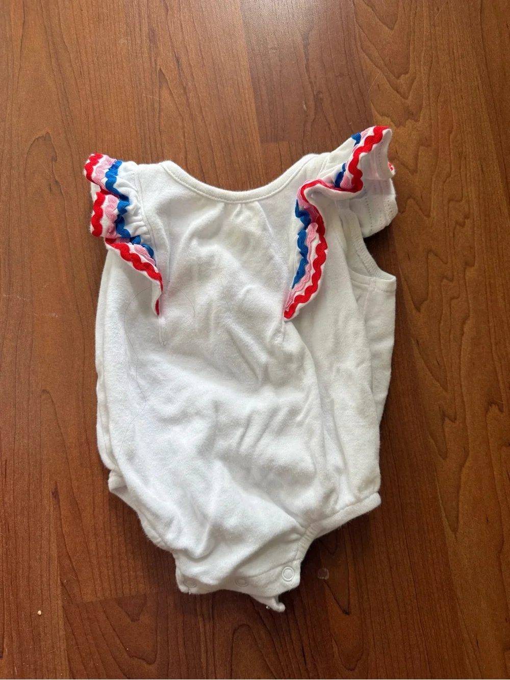 White Baby Romper with Red & Blue Ruffle Sleeves
